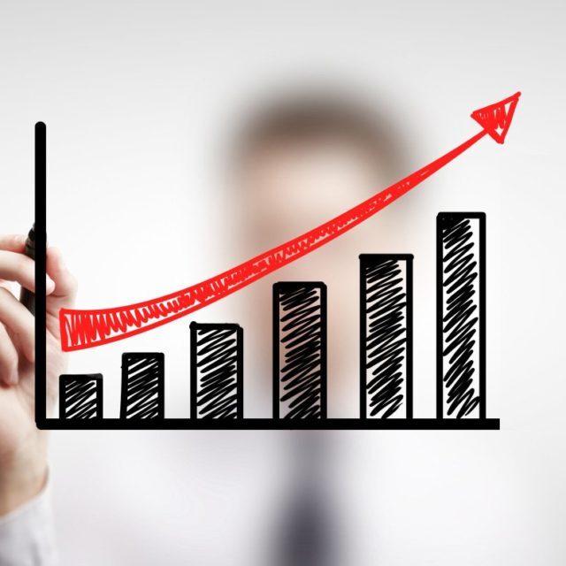 man drawing schedule of business growth